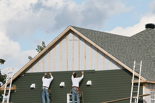 Professional Siding Replacement technician working in Fishertown, PA